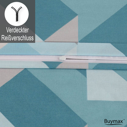 Nahaufnahme eines verdeckten Reißverschlusses auf einer Bettwäsche mit geometrischem Muster in Blau- und Grautönen, mit Symbol und Text „Verdeckter Reißverschluss“.